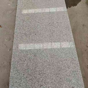 汕尾芝麻白光面毛板